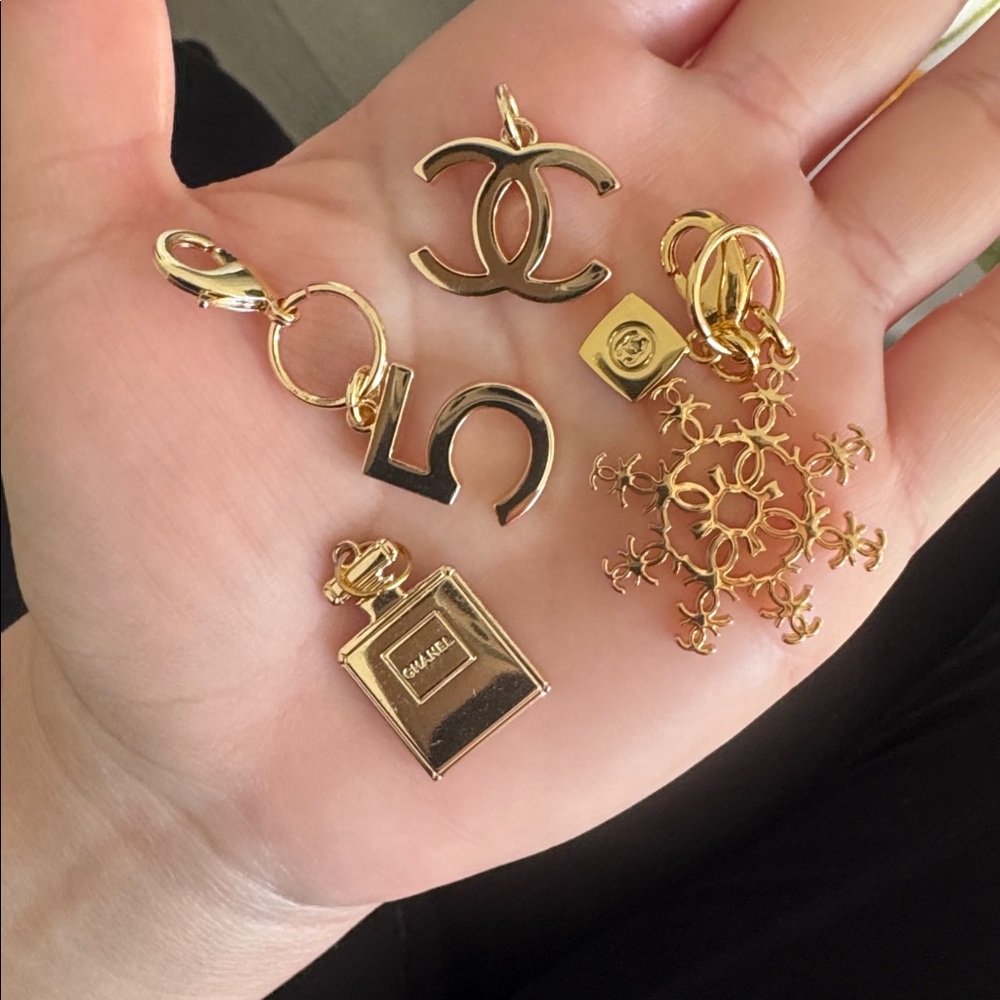 Charm set. 4 Chanel logo fragrance charms.